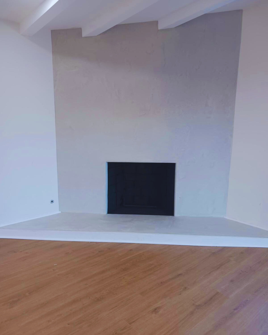 Modern Interior Stucco Fireplace